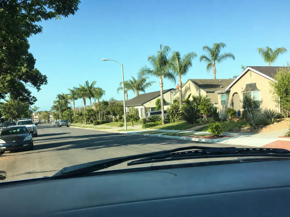 Service van arriving on a Studio City, CA street — local same-day coverage